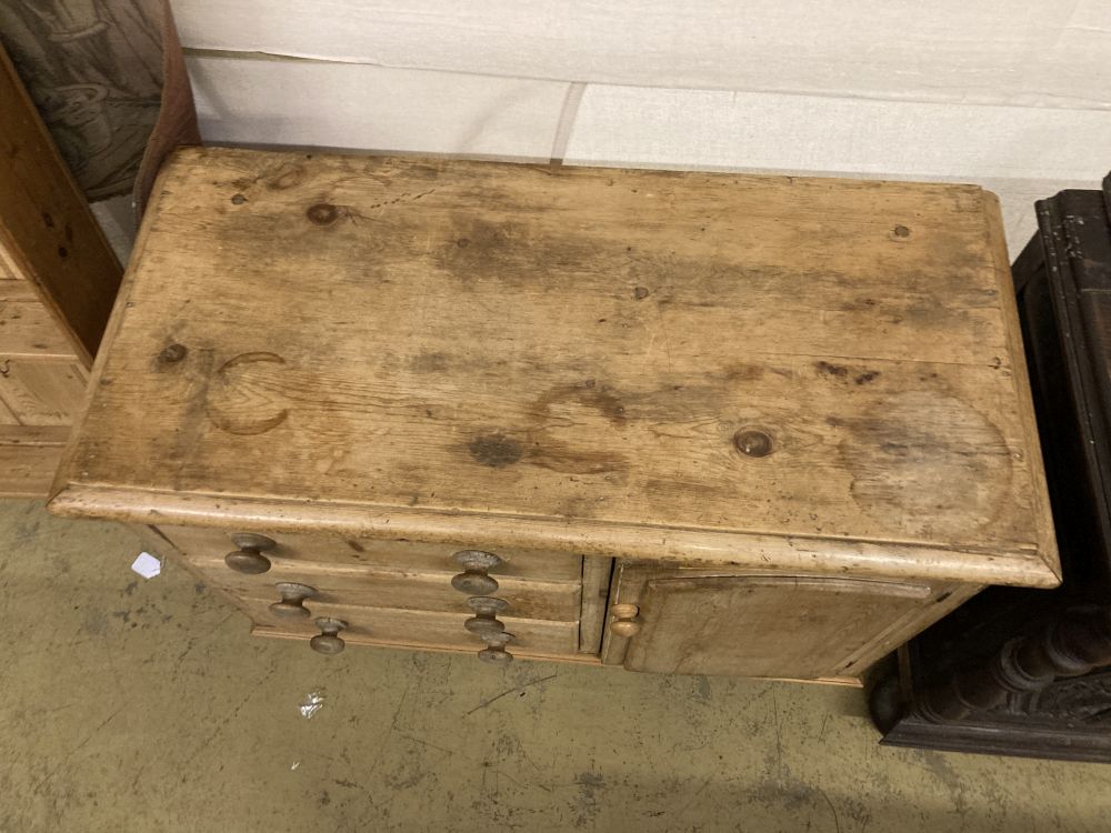 A Victorian pine dresser base, together with a panelled pine plate rack, base width 107cm, depth 50cm, height 80cm